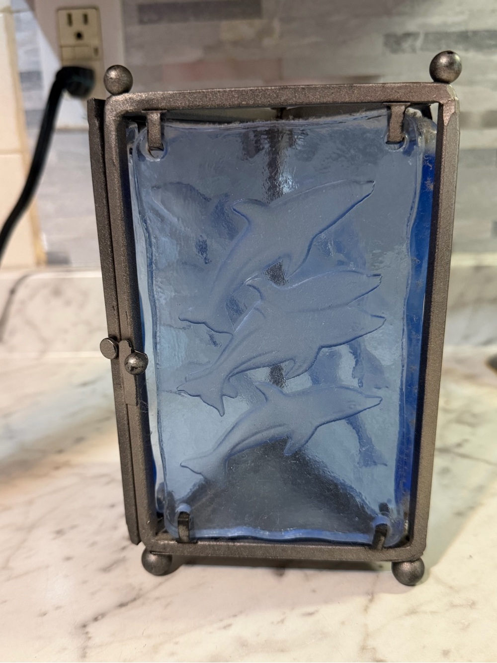 Triangle dolphin candle holder